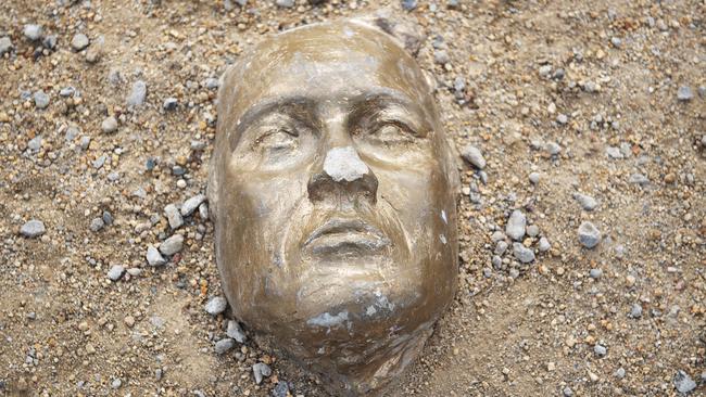 The mysterious Golden Head was rediscovered buried in the dirt. Picture: Ellen Smith