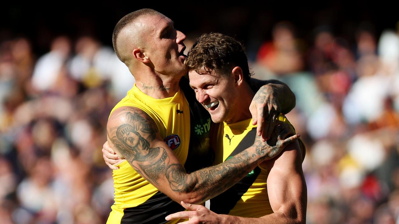 Dustin Martin and Jacob Hopper are both only expected to miss one week with their respective injury concerns. Picture: James Elsby / Getty Images