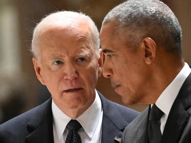 US President Joe Biden (L) and former US President Barack Obama attend a memorial service for Ethel Kennedy on October 16, 2024, at the Cathedral of St. Matthew the Apostle in Washington, DC. Kennedy, a tireless advocate for human rights and widow of assassinated US politician Robert F. Kennedy, died on October 10, 2024 at the age of 96, her family said. (Photo by Mandel NGAN / AFP)