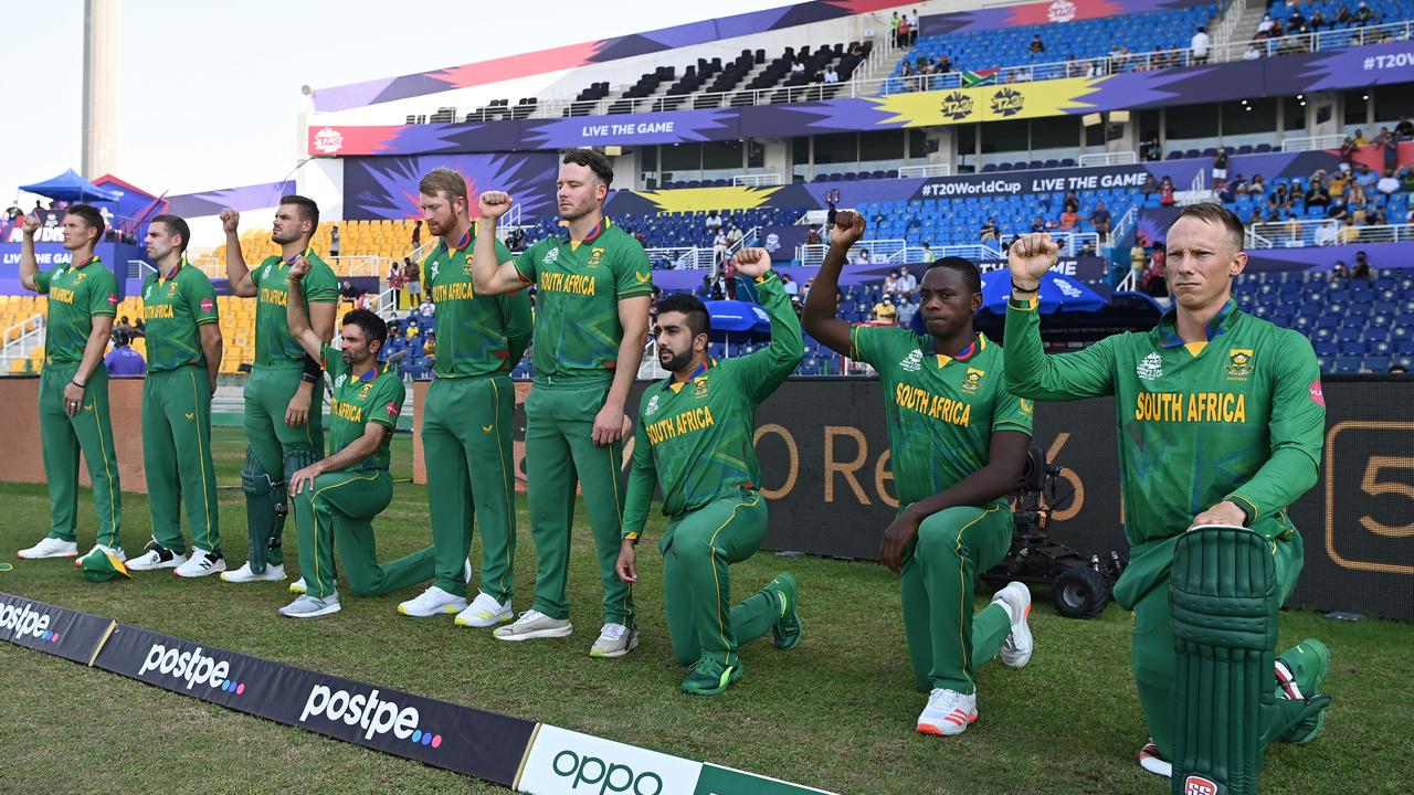 Some players take a knee and others don’t before South Africa’s World Cup match against Australia. Picture: Gareth Copley-ICC/ICC via Getty Images