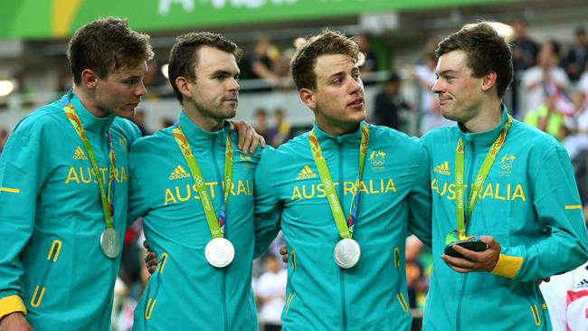 Alex Edmondson, far right, with Michael Hepburn, Jack Bobridge and Sam Welsford after Australia's men's team pursuit team won the silver medal at the 2016 Rio Olympics. Picture: Adam Head