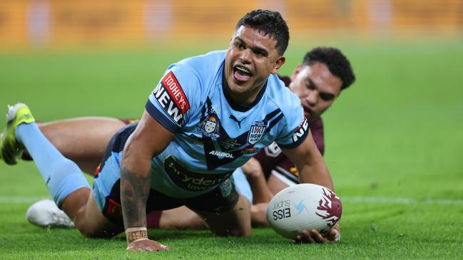 Latrell Mitchell scores an intercept try. Picture: Peter Wallis