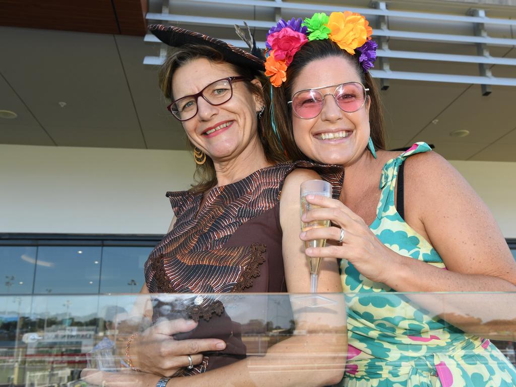 Christine Isaacs and Alex Marshall at the Darwin Turf Club Bridge Toyota Ladies' Day / Derby Day. Picture: KATRINA BRIDGEFORD