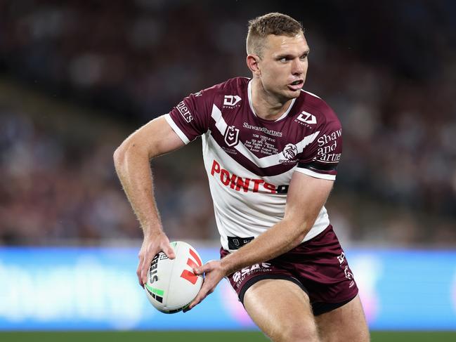 SYDNEY, AUSTRALIA - AUGUST 30: Tom Trbojevic of the Sea Eagles passes during the round 26 NRL match between Canterbury Bulldogs and Manly Sea Eagles at Accor Stadium, on August 30, 2024, in Sydney, Australia. (Photo by Cameron Spencer/Getty Images)