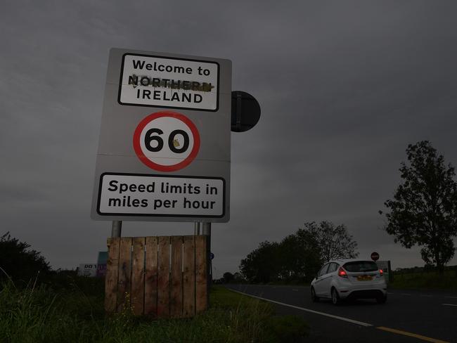 A defaced Welcome to Northern Ireland sign on the border between Northern Ireland and the Republic of Ireland in Londonderry. Picture: Getty Images