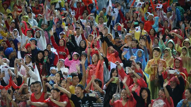 Another happy Asian crowd... in Australia. AP Photo/Rick Rycroft.