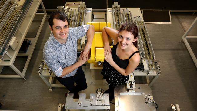 Manufacturing in Western Sydney: Mechanical engineering students at Western Sydney University's Kingswood campus Peter Lendrum and Toni Pearcey pictured at a robotic assembly workshop. Picture: Toby Zerna