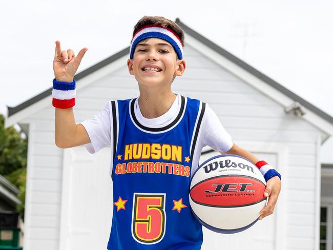 The Daily Telegraph Friday 31 January 2025Mt Kosci Basketball Boy - Hudson9 year old Hudson has be diagnosed with cerebral palsy he is now doing a climb at Mount Kosciusko and attempting the worlds height basketball trick shot  to raise money for cerebral palsy. Picture Thomas Lisson