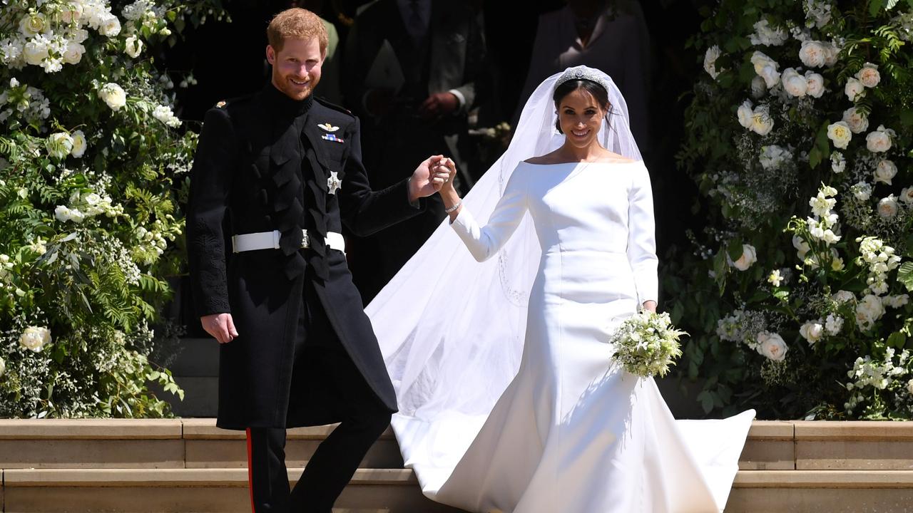 They both appeared to be nothing but carefree on the big day. Picture: Neil Hall/Pool via Reuters