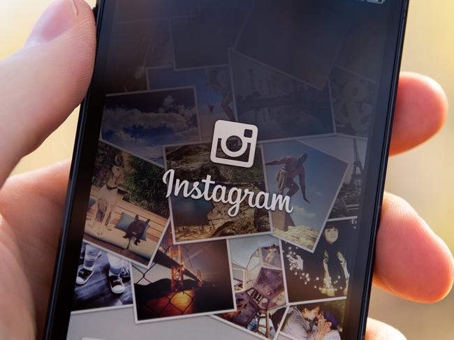 Nizhnevartovsk, Russia - June 12, 2013: Man hand holding iPhone 5 with Instagram App. iPhone is product Apple Inc. Instagram is an online photo-sharing and social networking service. Photo: Istock