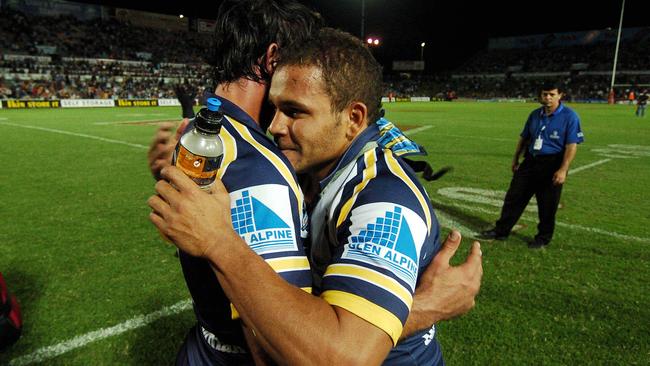 Johnathan Thurston and Matt Bowen celebrate a Cowboys win.