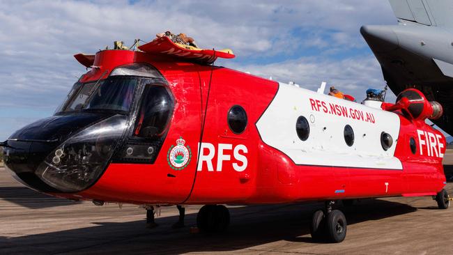 The $9 million Chinook CH-47 arrives in Australia. It will not be fitted with an internal tank until next year and will instead rely on a 10,000 litre bucket. Picture: David Swift