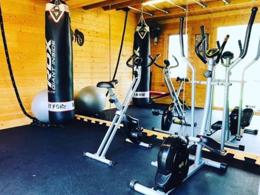 Deborah runs Zoom boxing sessions from her home gym. Picture: Instagram/dgboxingcoach