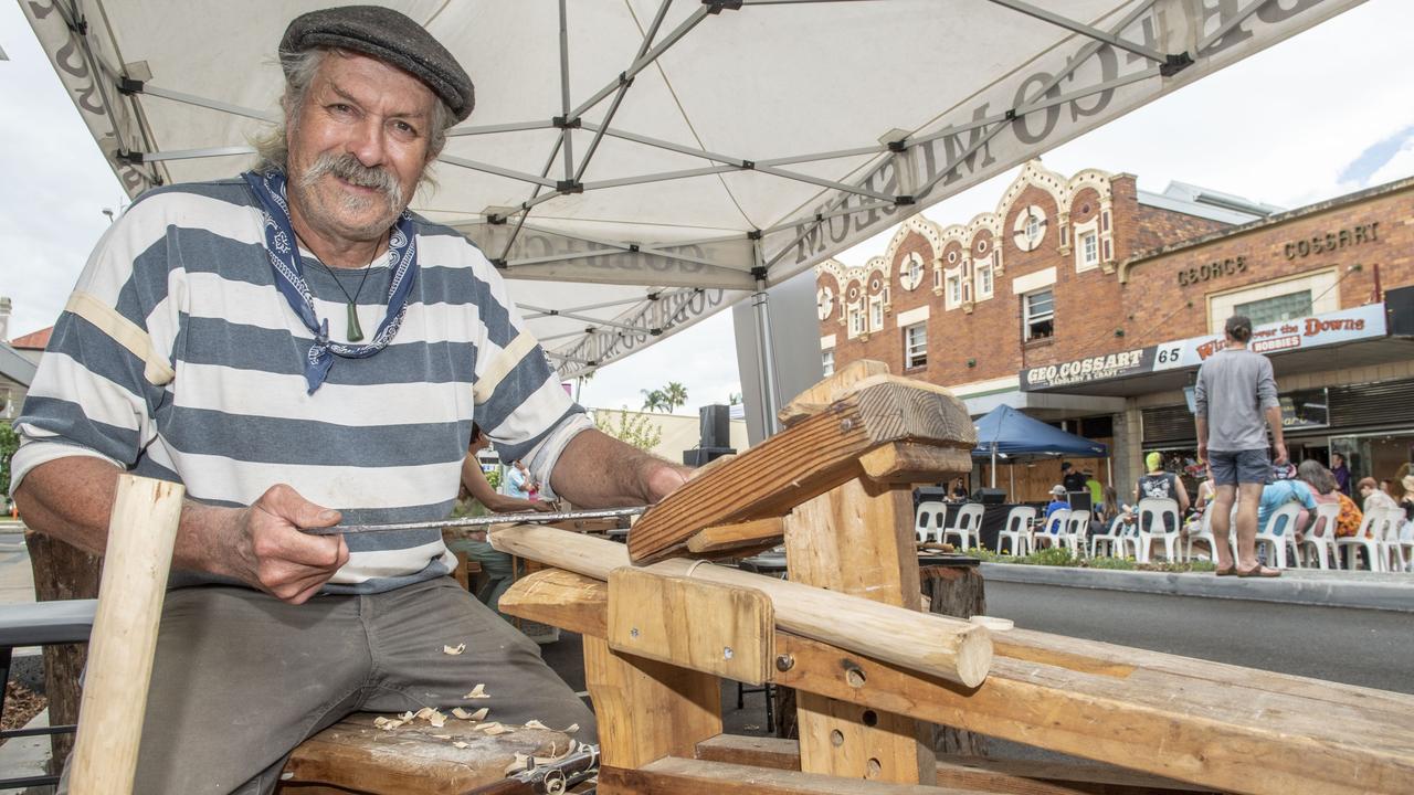 Andrew MacDonald from Cobb+Co Museum demonstrates woodworking skills at the Russell Street Refresh block party. Saturday, November 20, 2021. Picture: Nev Madsen.