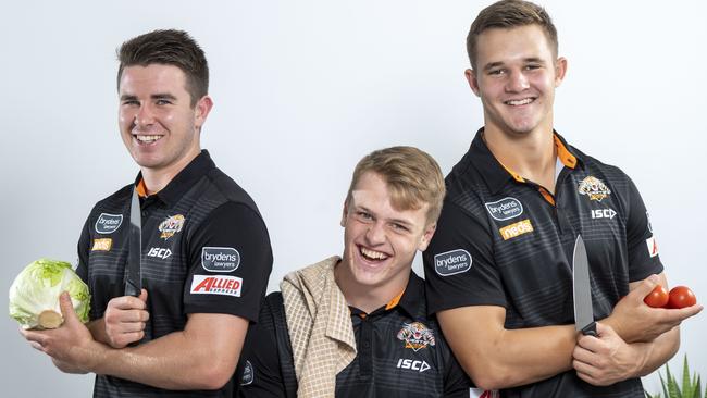 The three West Tigers development players each have their role in the share house with Reece Hoffman admitting he cleans better than he cooks. Pic: AAP/Matthew Vasilescu.