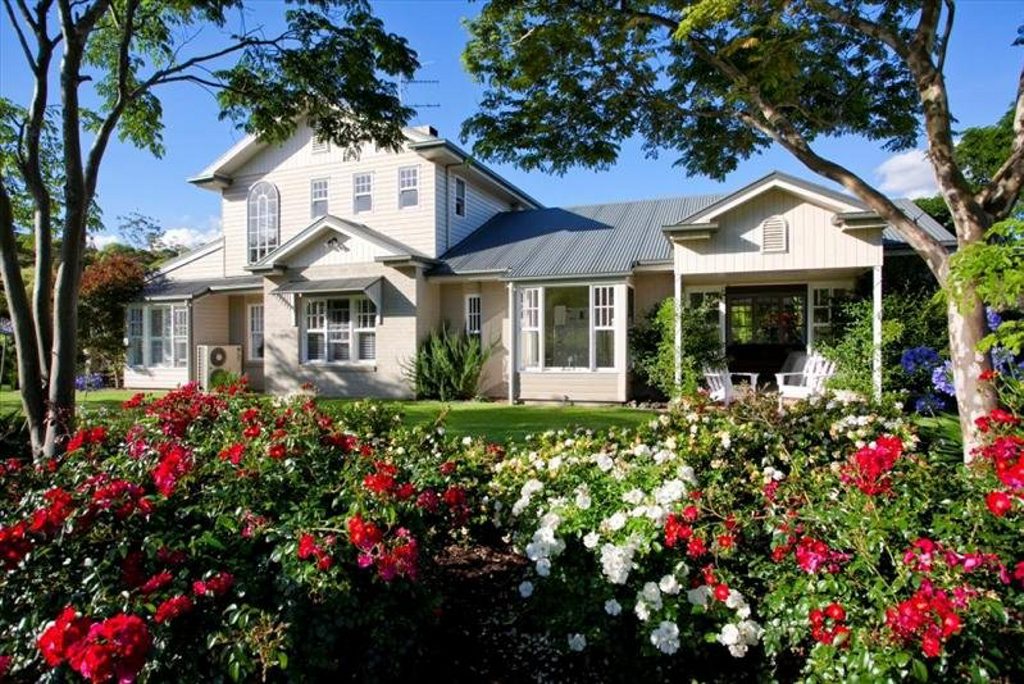 This million-dollar Cabarlah home boasts some of the most stunning gardens in the region. Picture: Contributed