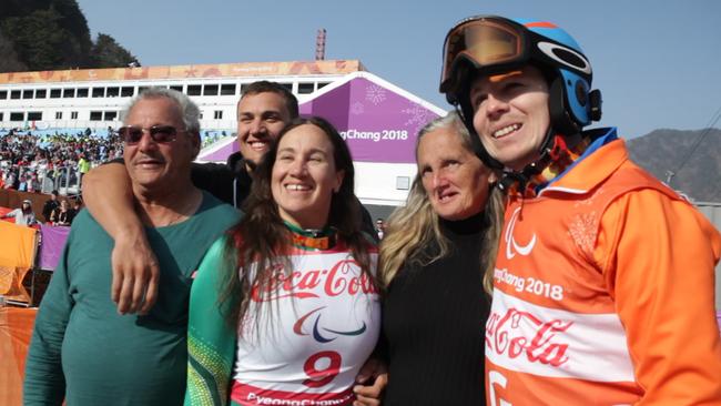 Australian Paralympian Melissa Perrine and her family after winning bronze.