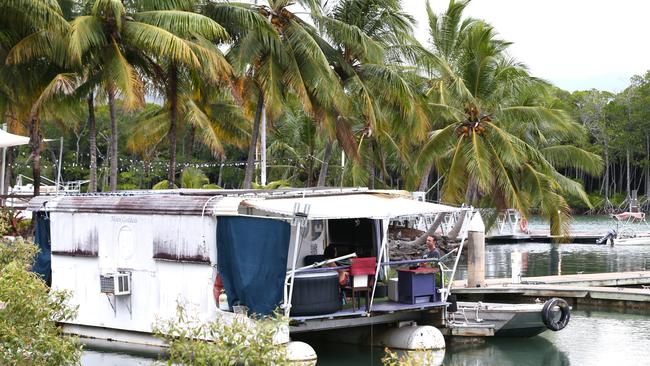 The houseboat of former Hollywood stunt woman Tiffiny Lynn remains the only vessel at the Quicksilver marina at Port Douglas as Cyclone Jasper advances toward the coast. Picture: Peter Carruthers