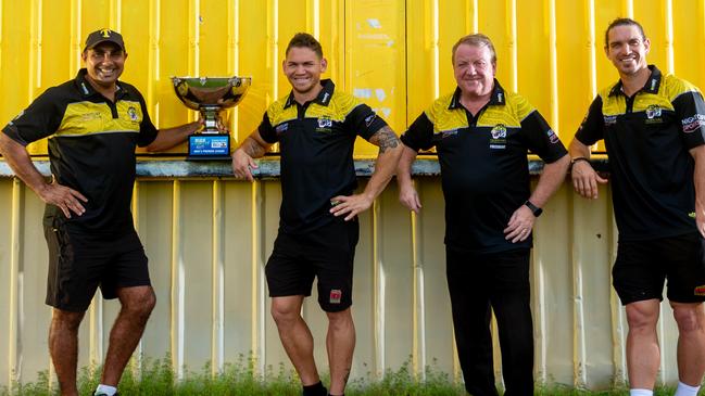 Their Cup runneth over: coach Chris Baksh, captain Phillip Wills, president Mark Dodge and assistant playing coach Cameron Ilett with the 20-21 Premier League Cup at Nightcliff Oval. Picture: Che Chorley