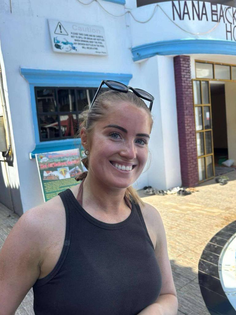 Simone White, pictured, outside the pair’s hostel Nana Backpackers in Vang Vieng.