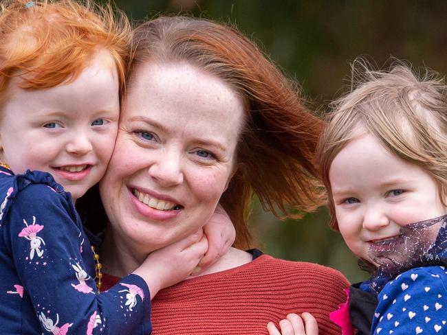 Mum Ellen Sowersby says childcare costs keep going up and eat up the government subsidy on offer - calling for more help from govt. Ellen has two twin girls aged 3, Mia and Ava (red hair).Picture Jay Town