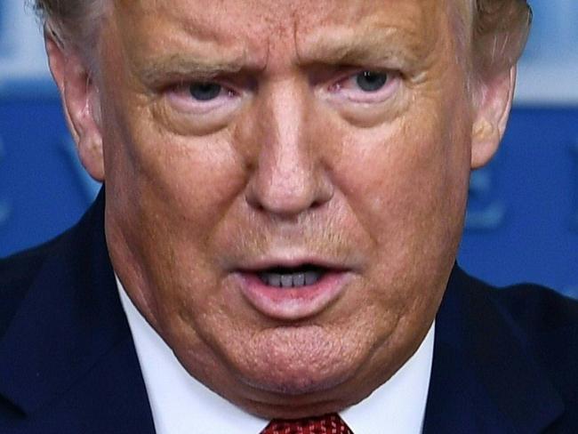 US President Donald Trump speaks to the press in the Brady Briefing Room of the White House in Washington, DC, on August 10, 2020. - Secret Service guards shot a person, who was apparently armed, outside the White House on Monday, President Donald Trump said just after being briefly evacuated in the middle of a press conference. The president was abruptly ushered out of the press event and black-clad secret service agents with automatic rifles rushed across the lawn north of the White House. Minutes later, Trump reappeared at the press conference, where journalists had been locked in, and announced that someone had been shot outside the White House grounds. Trump said he knew nothing about the identity or motives of the person shot, but when asked if the person had been armed, answered: "From what I understand, the answer is yes." (Photo by Brendan Smialowski / AFP)