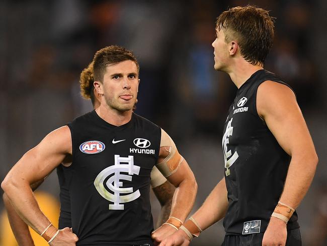 Marc Murphy and Patrick Cripps look for answers after the loss to Collingwood. Pic: AAP