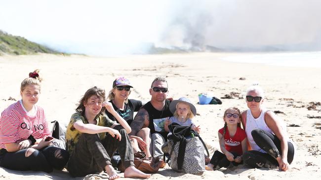 Families fled to Diamond Beach to seek refuge from the fires. Picture: Peter Lorimer