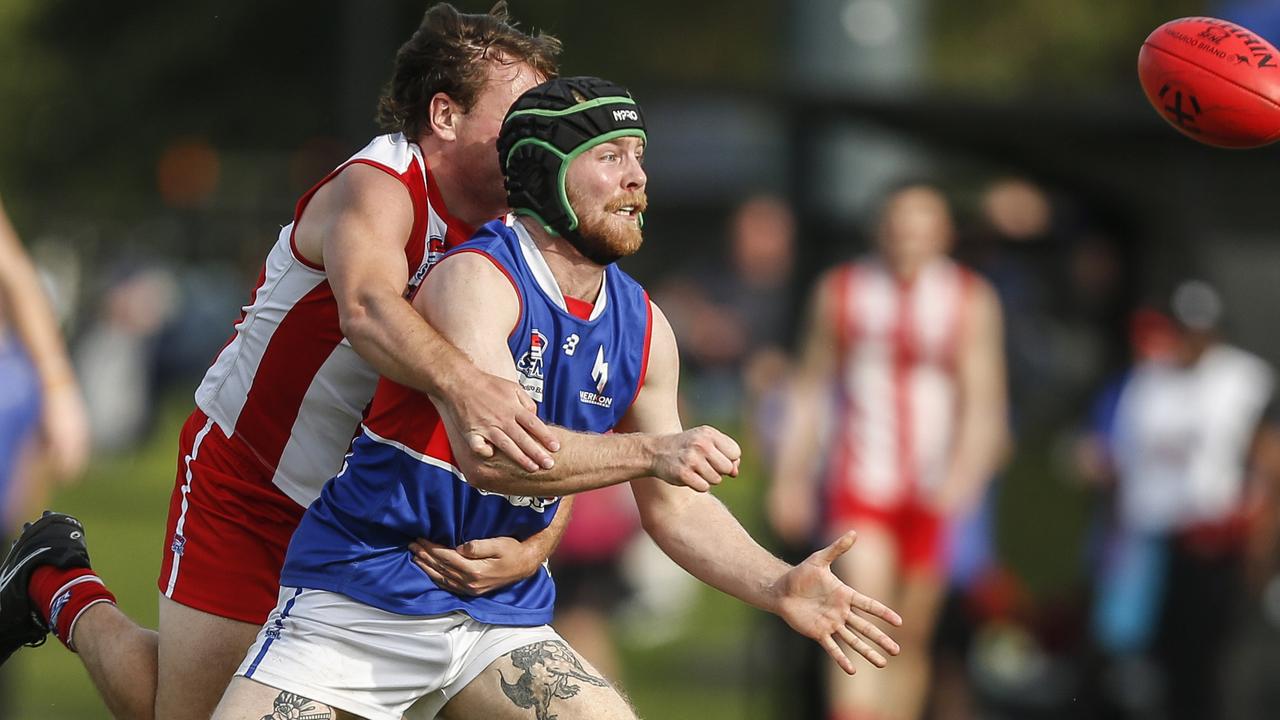 Southern: St Paul’s Connor Byrne gets a handball away under pressure. Picture: Valeriu Campan