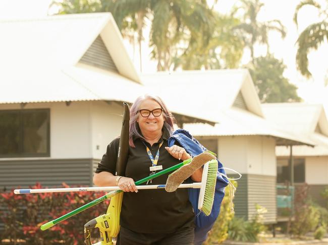 Front office Manager come cleaner Jayne Goodes sprucing up the joint as Darwin FreeSpirit Resort staff were flooded with calls since Thursday's announcement that border restrictions will ease next month.Picture GLENN CAMPBELL