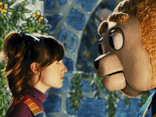 Arielle Smiles (played by Kate Lyn Sheil) with Brigsby Bear in a scene from film Brigsby Bear