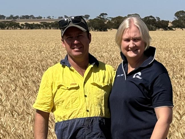 Bruce and Heather Talbot in a crop of wheat on their Western Australian property. Picture: Supplied