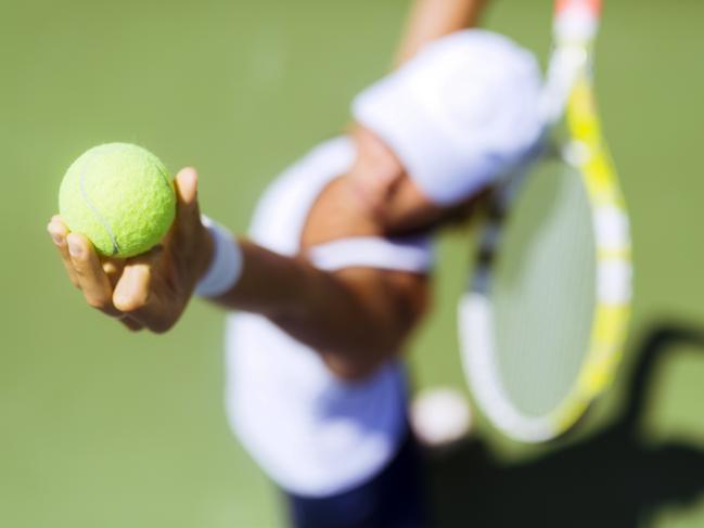 Beautiful female tennis player serving outdoor and a closeup of the serve from above