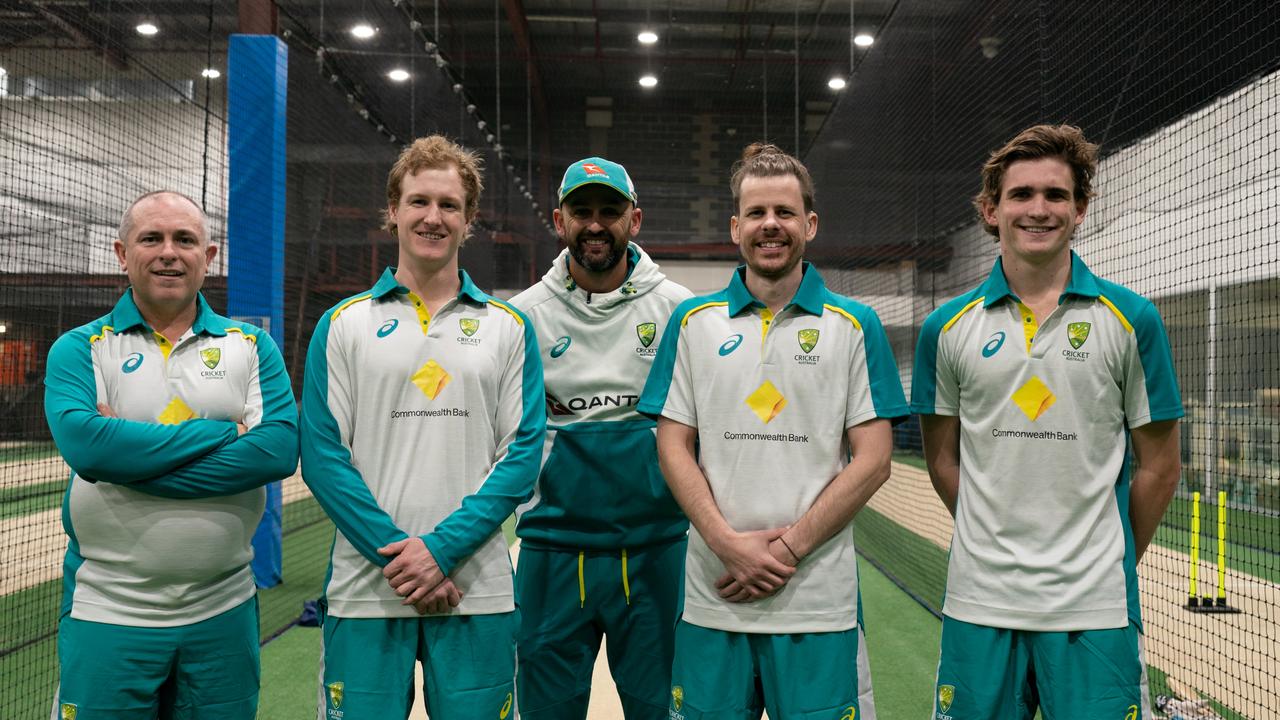 Nathan Lyon (C) pictured with members of the Australian deaf cricket team.