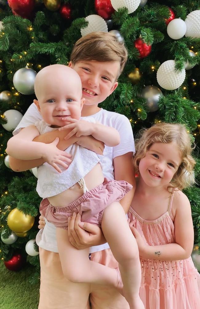 Little Lola with her brother and sister on her first and final Christmas. Picture: Supplied