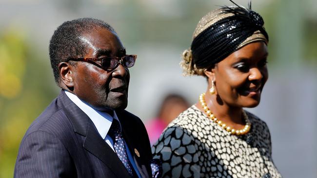 Zimbabwean President Robert Mugabe (L) arriving with his wife Grace for the inauguration ceremony of South African President Jacob Zuma in 2014. Picture: AFP / Siphiwe Sibeko.