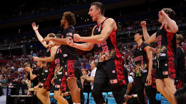 SYDNEY, AUSTRALIA - FEBRUARY 11: The Hawks bench celebrate during the round 19 NBL match between Sydney Kings and Illawarra Hawks at Qudos Bank Arena, on February 11, 2024, in Sydney, Australia. (Photo by Mark Kolbe/Getty Images)