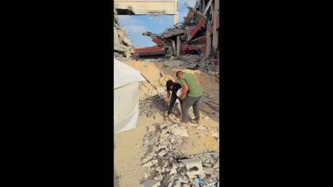 Artists Paint Mural at Destroyed Gaza School