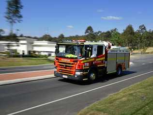 Queensland Fire and Emergency Service was called to an accident on the highway. Picture: David Nielsen