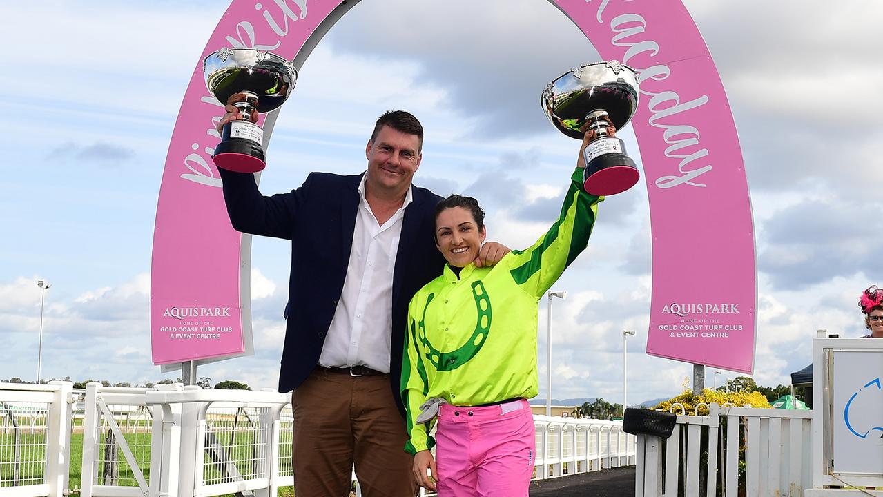 Trainer Chris Anderson (left) with jockey Tegan Harrison as they celebrate winning the Pink Ribbon Cup at the Gold Coast. Picture: Trackside Photography