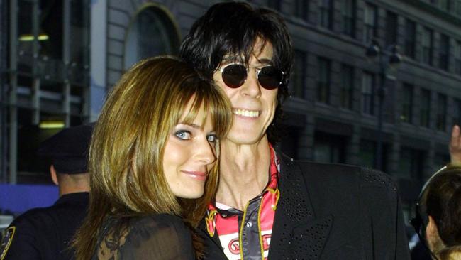 Cars rocker Ric Ocasek arrives with wife Paulina Porizkova with Ric Ocasek in 2001. Picture: Doug Kanter/AFP