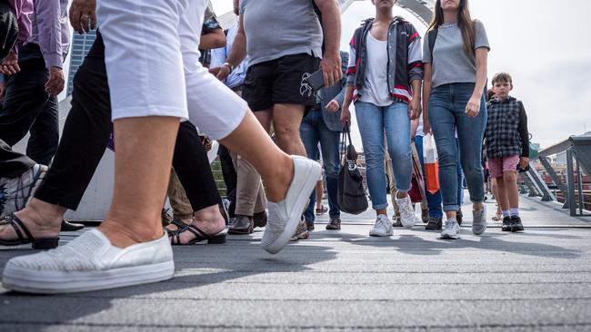 Heavy pedestrian traffic on Evan Walker Bridge at Southbank has led to creaky boards and noisy crossings. Picture: Jake Nowakowski