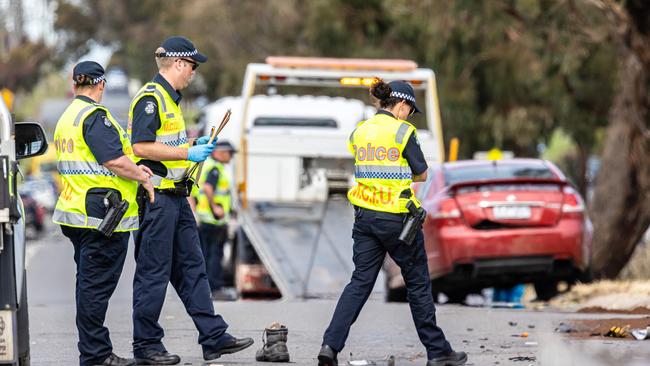 Police at the scene of the horrific crash. Picture: Jason Edwards