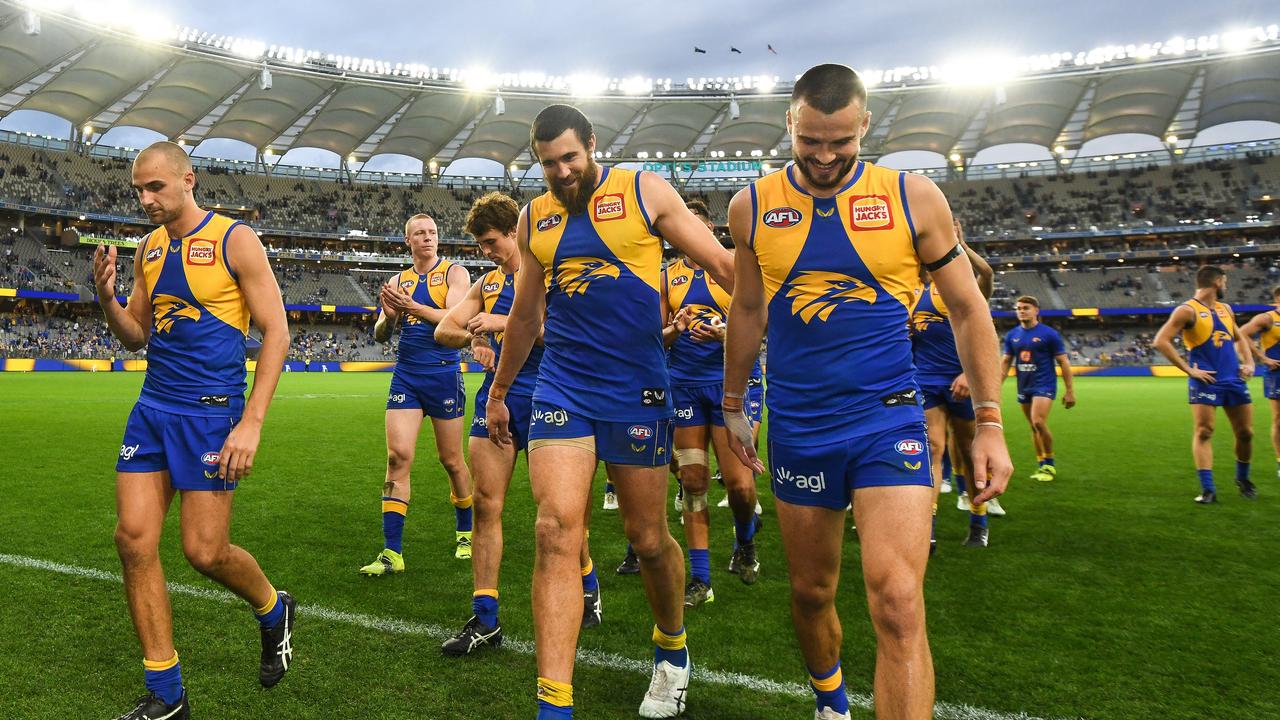 Dom Sheed, Josh Kennedy and Josh Rotham head into the rooms after their latest win.