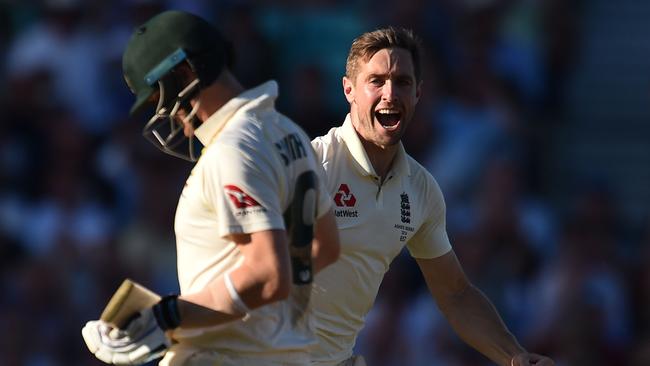 Chris Woakes removes Steve Smith for 80 in the final session on day two. Picture: AFP