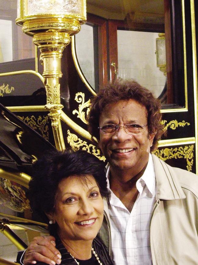 Kamahl and his wife with the Royal Coach used in Prince William and Kate’s wedding, 2011, made in Manly by Jim Frecklington. Picture: Supplied