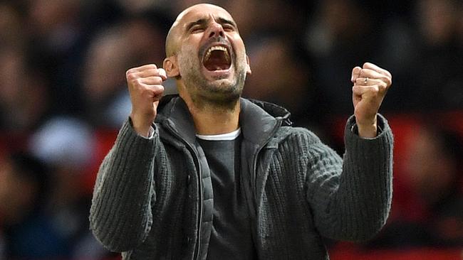 Manchester City manager Pep Guardiola celebrates after Leroy Sane scored his side’s second goal against Manchester United at Old Trafford. Picture: Getty Images