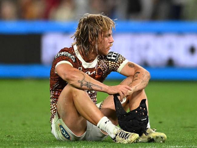 BRISBANE, AUSTRALIA - JULY 13: Blake Mozer of the Broncos looks dejected after his team's defeat during the round 19 NRL match between Brisbane Broncos and St George Illawarra Dragons at Suncorp Stadium, on July 13, 2024, in Brisbane, Australia. (Photo by Albert Perez/Getty Images)