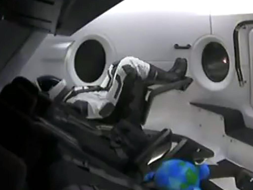 This video grab taken from the Space X webcast transmission on March 2, 2019, shows a dummy named Ripley onboard a SpaceX Falcon 9 rocket with the company's Crew Dragon spacecraft onboard lifting off during the Demo-1 mission, at the Kennedy Space Center in Florida on March 2, 2019. (Photo by HO / SPACEX / AFP) / RESTRICTED TO EDITORIAL USE - MANDATORY CREDIT "AFP PHOTO / SPACEX" - NO MARKETING NO ADVERTISING CAMPAIGNS - DISTRIBUTED AS A SERVICE TO CLIENTS ---