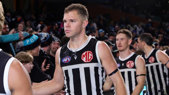 ADELAIDE, AUSTRALIA - AUG 17: Dan Houston of the Power with fans after the win during the 2024 AFL Round 23 match between the port Adelaide Power and the Adelaide Crows at Adelaide Oval on August 17, 2024 in Adelaide, Australia. (Photo by Sarah Reed/AFL Photos via Getty Images)